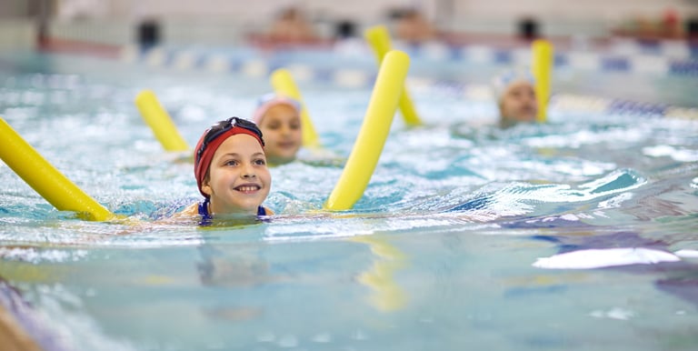 child learning to swim