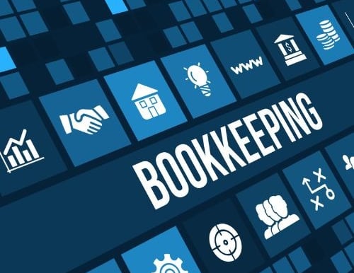 Construction bookkeeping specialist managing cash flow