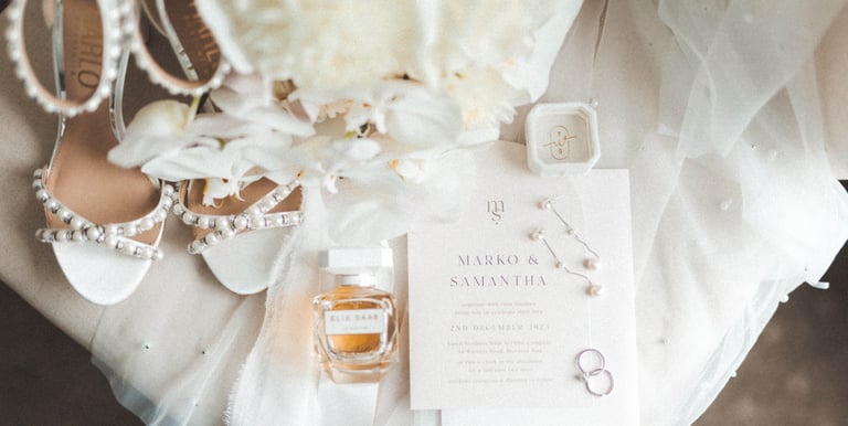 a wedding dress and shoes on a table