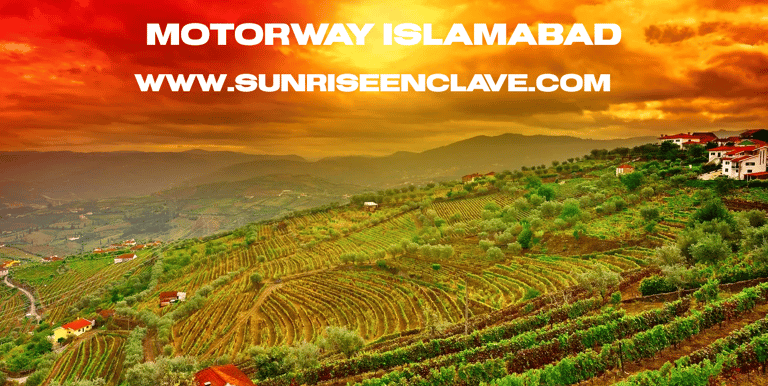 a scenic view of a mountain range in the sun