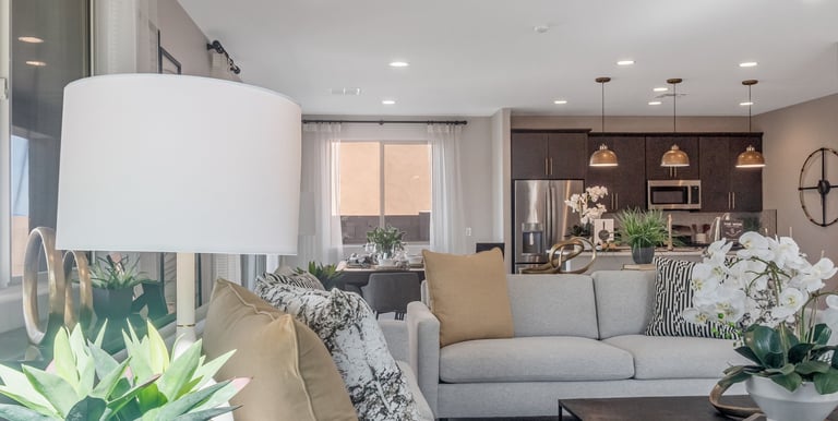 a living room with a couch and a table