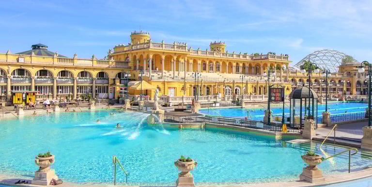 a large pool with a fountain and a fountain