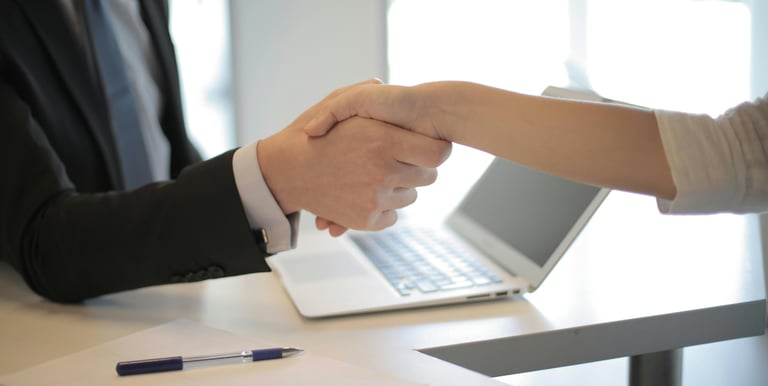 shaking hands, reaching an agreement, helping with implementation and settlement of prg with 