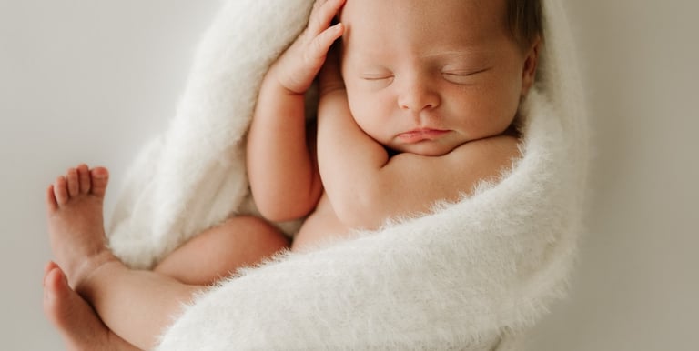 newborn baby peacefully sleeping in studio setting – newborn photography Adelaide Hills