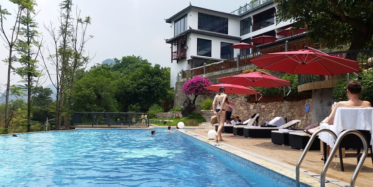 Enjoy a refreshing swim at The Yangshuo Li River Resort's pool