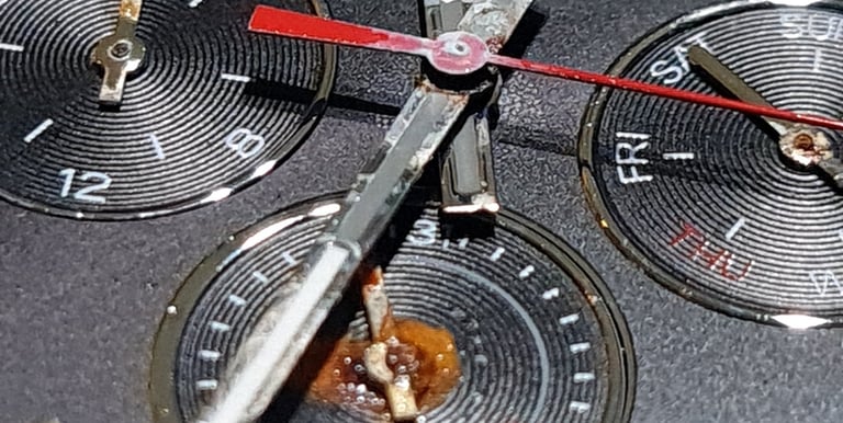 a close up of a watch with a watch face