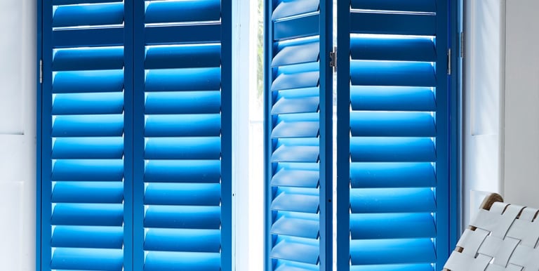 Full height plantation shutters in contemporary kitchen