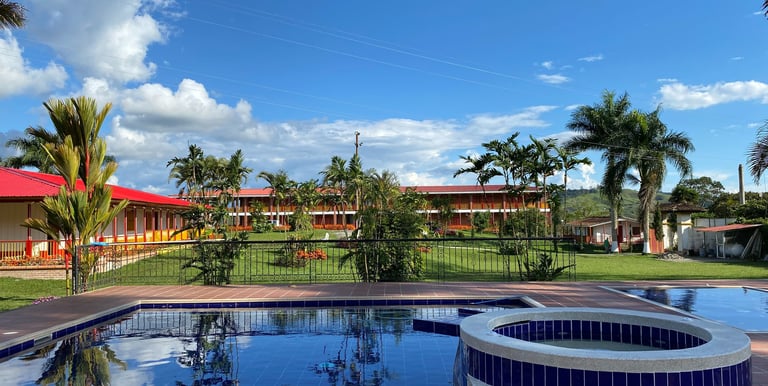 a pool with a pool and a fenced in area