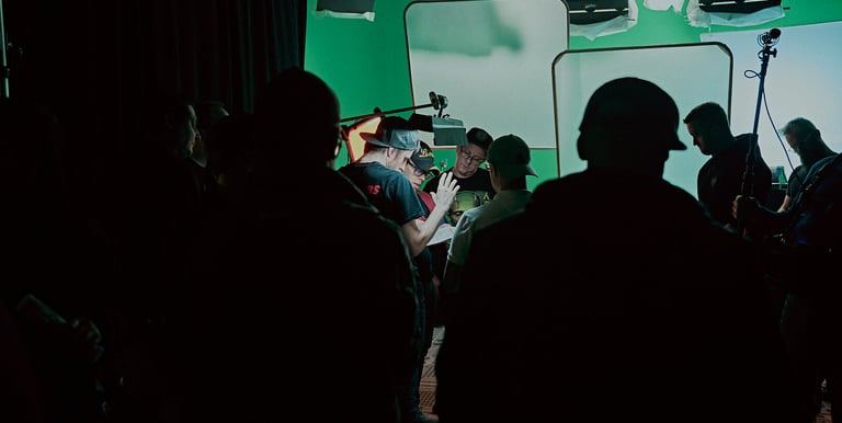 Production team in the process of setting up a shot on the set of Lupe Q Corn Cake