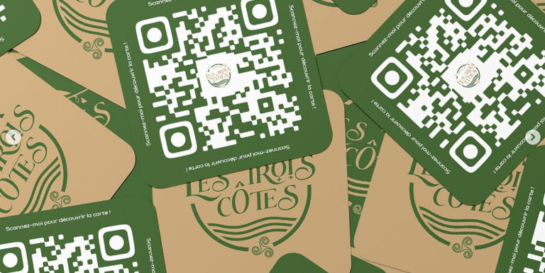 a bunch of stickers with a qr code - code on them