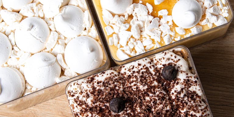 a variety of desserts in a variety of containers