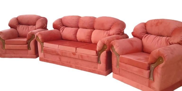 a set of three couches with a red couch