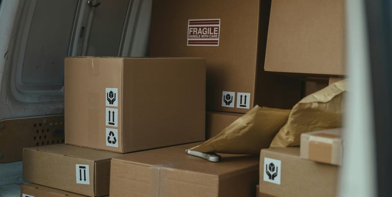 Cargo van loaded with boxes, ready to make its shipment.