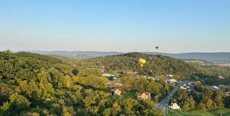 a group of hot air balloons in the sky