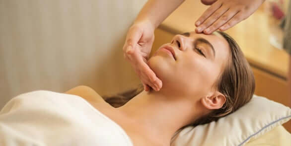 a woman getting a  facial deep skin cleaning  at a spa