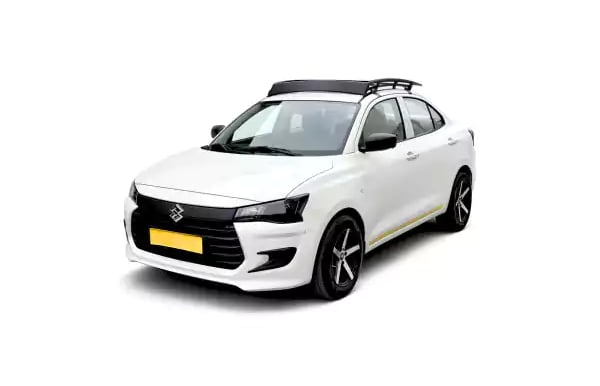 White Maruti Dzire one way taxi by Saini taxi services with a luggage carrier rack