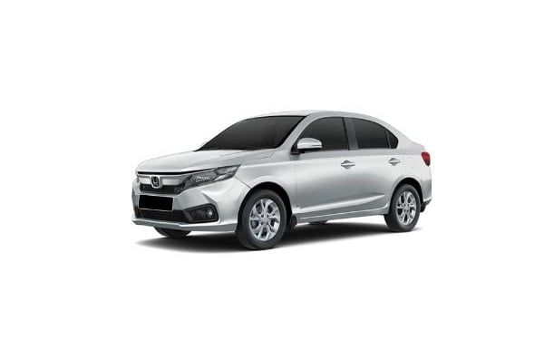 a silver Honda Amaze car parked on a white background