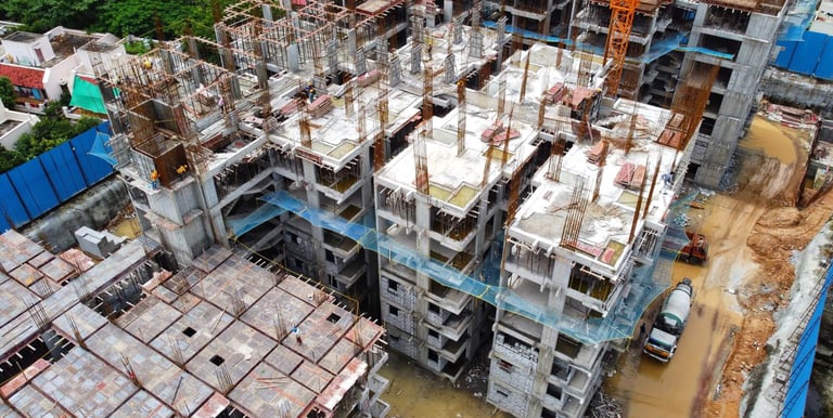 a building being built into a building with a crane