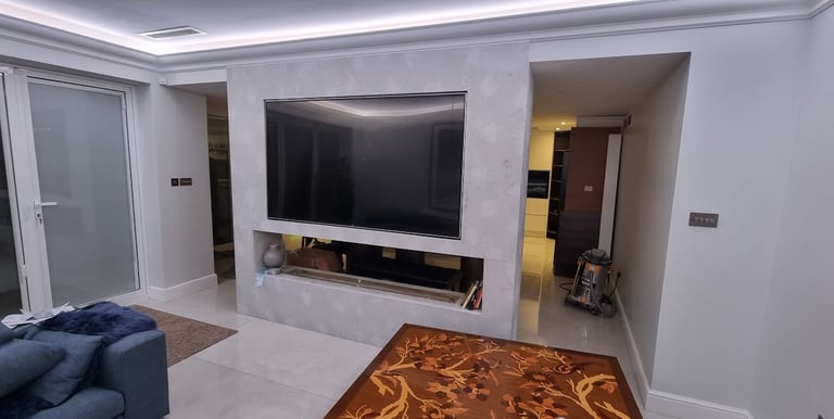MountMyTV - Sony Bravia 85" TV mounted onto a custom built marble media wall