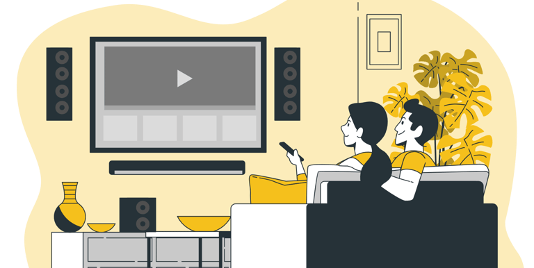 a couple sitting on a couch watching streaming content on their large screen TV wireless speakers