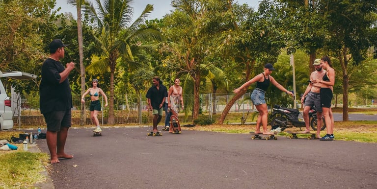 Skater riding a surf skate at Paradise Surf School in Lombok, blending surfing and skateboarding