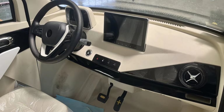 dashboard and center control panel of Impulse Electromotive Nano-3 Micro EV car