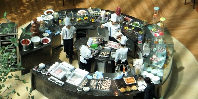 Unistaff catering chefs working at a live food station during an event