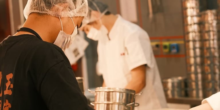 Unistaff Kitchen staff working in a professional food service environment