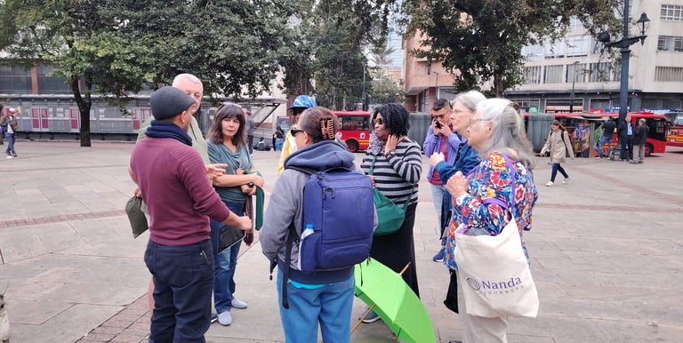 Happy tourist wearing custom emerald ring made in Bogota