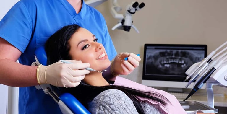 Lady in dental chair, dental surgery CPR training.