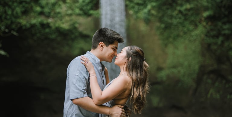 Intimate close embrace during prewedding at Tibumana Waterfall Bangli Bali