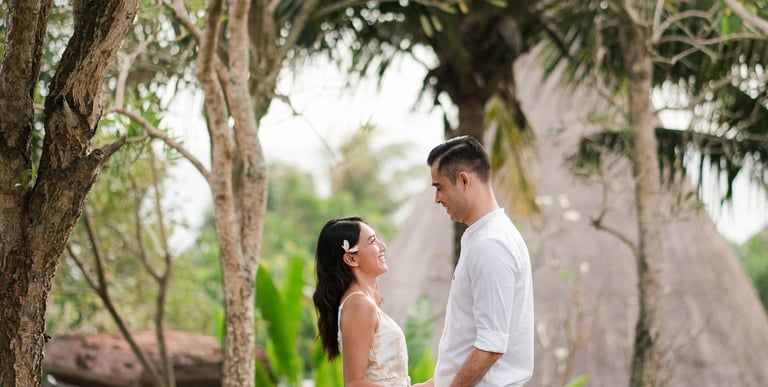 Couple walking together along the garden pathway at Waka Gangga Tabanan West Bali