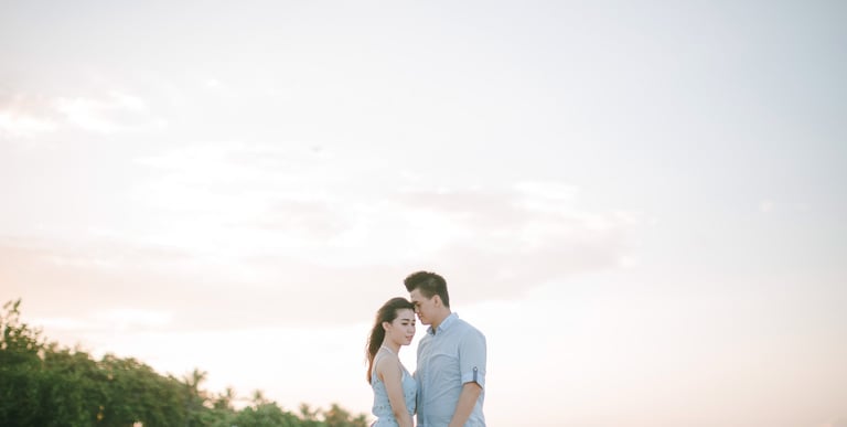 Romantic sunset couple portrait at Sofitel Bali Nusa Dua Beach Resort.