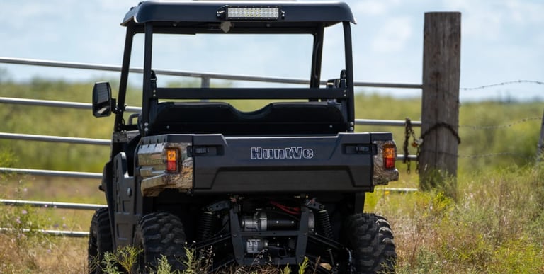 huntve utv parked outside a gate