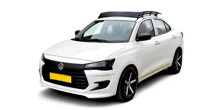 White Maruti Dzire one way taxi by Saini taxi services with a luggage carrier rack