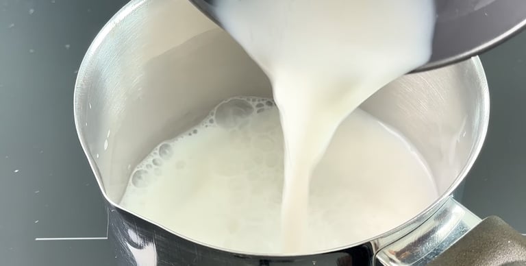 Warm the milk to a gentle simmer