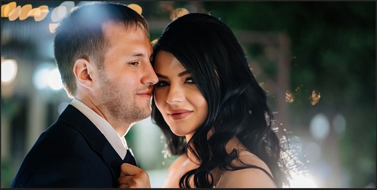 a man and woman standing next to each other