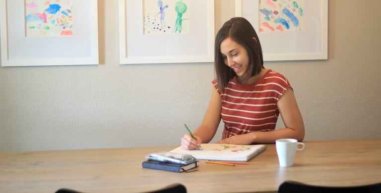 Photo of artist and illustrator Sarah Kirk