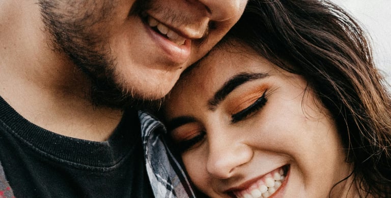 woman and man sharing a genuine moment of deep connection and love