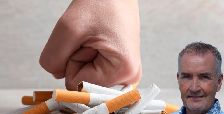a man with a cigarette in his hand and a cigarette