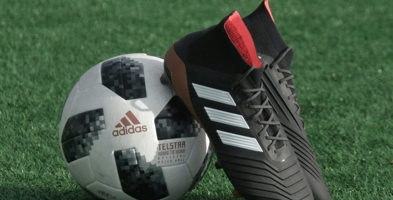 a soccer ball with a soccer ball on the ground