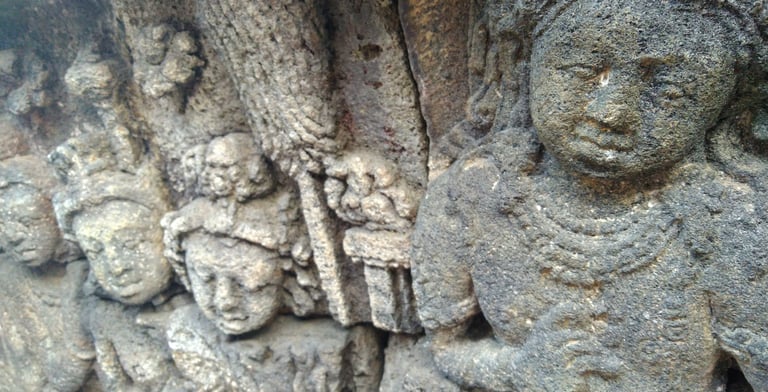 a stone carving on a temple in indonesia