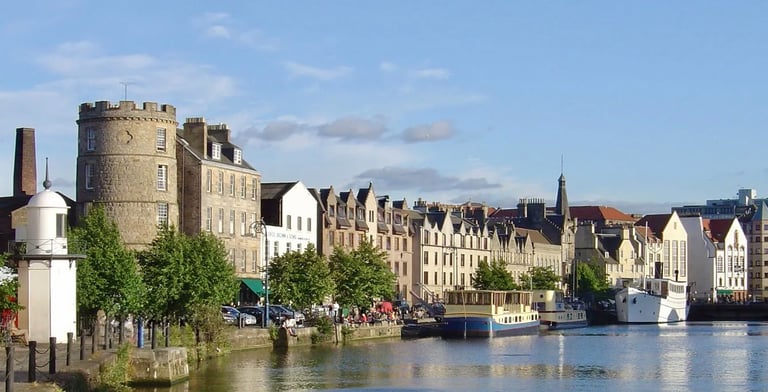 the water of leith with a boat in the water