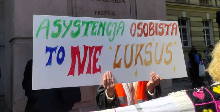 Kolorowy transparent "Asystencja osobista to nie luksus"