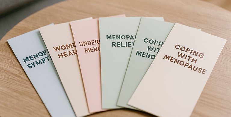 A series of medical pamphlets about menopause on a coffee table