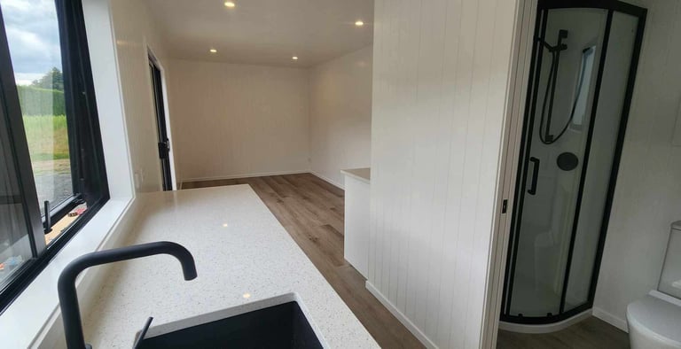 View of lounge from the kitchen in tiny home