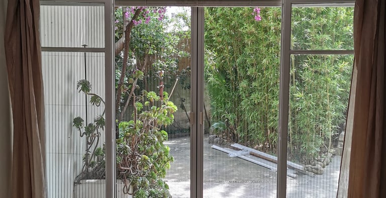 Moustiquaire plissée pour grande baie.