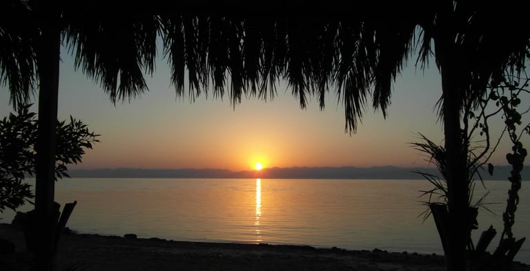 a sunrise over the red sea with a view of the sun rising Introduction to the Sunrise Experience Wi