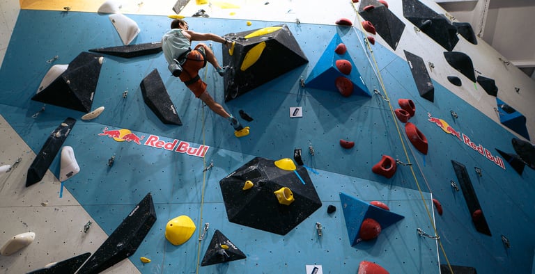 climber lead climbing on a big wall