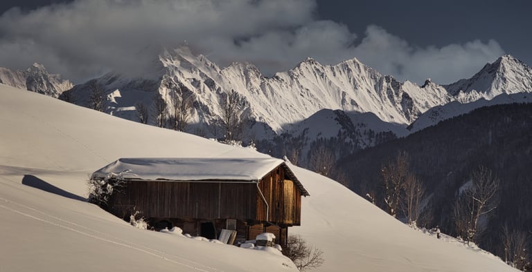 Winterlandschaft mit Hütte